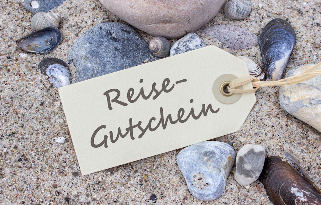 Reisebüro-Gutscheine im Supermarkt
